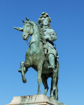 Versailles, France - July 07 2020: Close-up on Equestrian statue of Louis XIV (1831-1838) by Louis Petitot and Charles Crozatier.