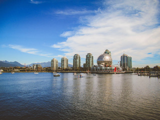 Sea, Science World and boats in Vancouver on a summer day.