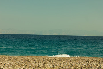 Fototapeta na wymiar Greek water surface. Sea. Rhodes island. Summer vacation. Euro-trip.