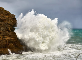 Breaking waves at Mayor Cape rocks in Cantabria