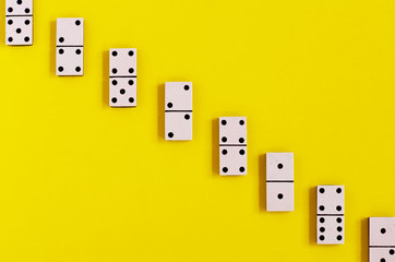 vintage old white Domino on a yellow background