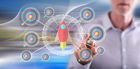 Man touching a business target concept