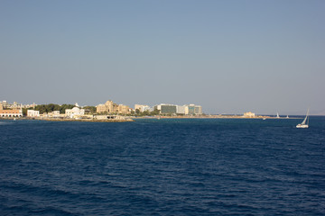 Fototapeta na wymiar Greece. Rhodes island. Rest at the sea. Euro-trip. Sea water surface. Coast of Greece.