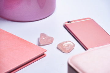phone, vase, notepad and makeup bag edge in pink style. Banner. Concept of fashion and beauty, modern, stylish. Flat lay, top view. Creative concept for shop style blog