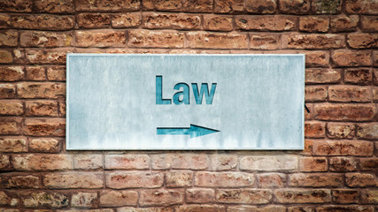 Fototapeta na wymiar Street Sign to Law