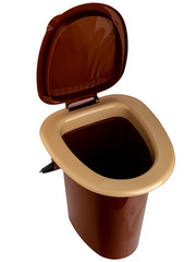 brown plastic bucket with handle and lid for the toilet in the house