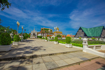 Fototapeta premium Background of important religious attractions in Bangkok (Loha Prasat or Wat Ratchanatdaram) is a beautiful golden pagoda, tourists all over the world always come to see the beauty in Thailand.