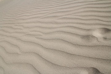 Fototapeta na wymiar Rippled sand dunes near Tingri on the way to Everest Base Camp, Tibet, China