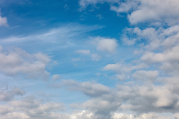 Naklejka na ściany i meble Beautiful blue sky with white fluffy clouds