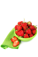 Fresh strawberries in a bowl isolated on white background