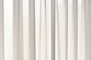 Obraz premium White curtain cloth at shiny window