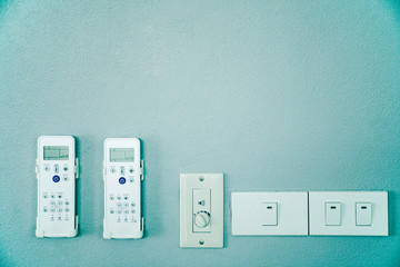 Electricity appliance remote control in home, Remote controller hang on the wall