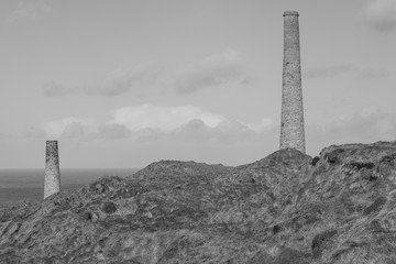 Landscape photo of disused industrial chimneys from the mining industry on the Cornish coast
