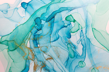Alcohol ink blue and gold abstract background. Ocean style watercolor texture.
