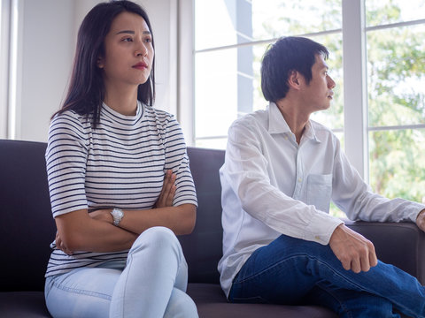 Asian women mourn and become irritated by their husband's behavior. After an argument and causing pain in the heart. Angry and not understanding each other, resulting to divorce