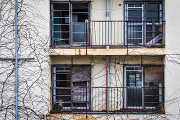 Fototapeta na wymiar Abandoned Ikeshima Coal Mine Island Apartment Windows