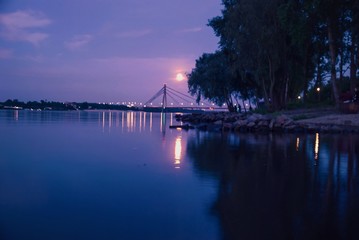 Fototapeta na wymiar Night view of the river, moonlight, landscape, beautiful colors, evening vibes, moon reflections 