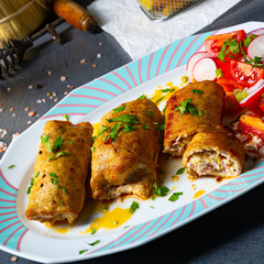 Vegetable roulade from roast  pork loins with salads