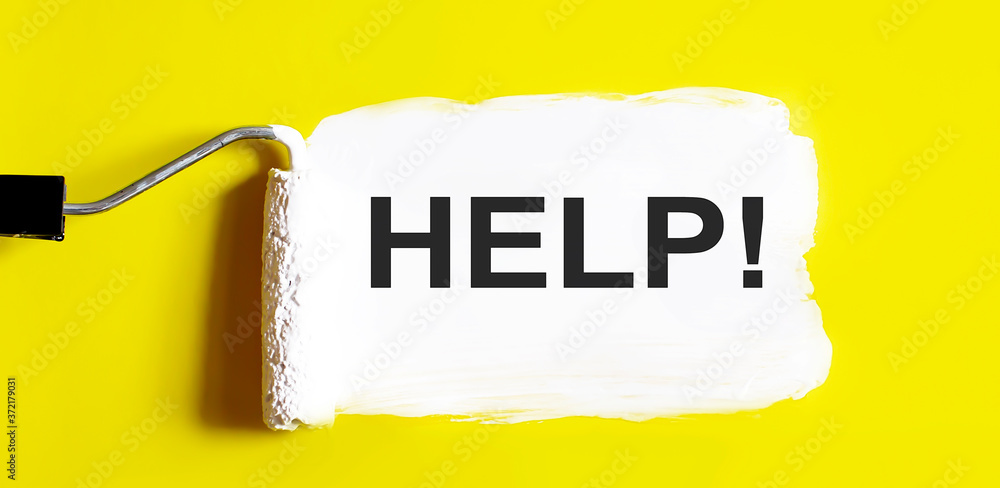 Poster help .one open can of paint with white brush on it on yellow background. top view.