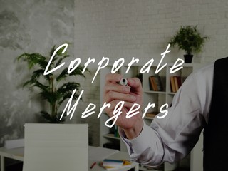 Financial concept about Corporate Mergers with phrase on the sheet.