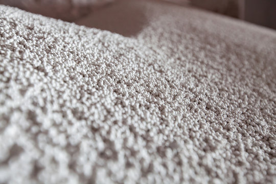 White granules (pellets) of phosphoric (phosphate) fertilizers on chemical fplant warehouse. Close-up photo.
