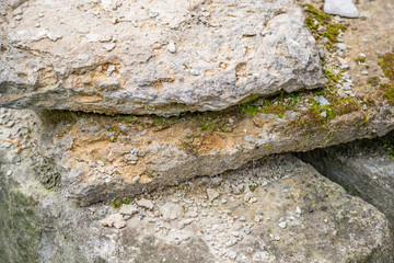 Original textured surface of of a natural coarse stone