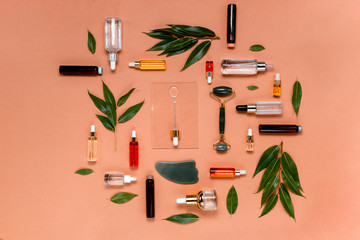Natural Serums and face oils. Cosmetic hydrating serum in a glass bottle with pipette close up....