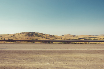 Obraz premium Russia. Travel across Russia. Hills, mountains and fields. Panorama of the steppes.