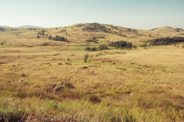 Russia. Travel across Russia. Hills, mountains and fields. Panorama of the steppes.