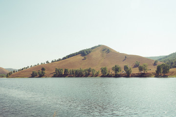 Russia. Travel across Russia. Hills, mountains and fields. Panorama of the steppes.