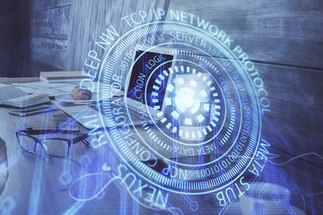 Double exposure of computer and technology theme hologram. Concept of freelance work.