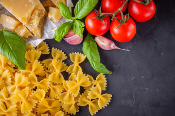 concept of traditional italian pasta with tomatoes and basil