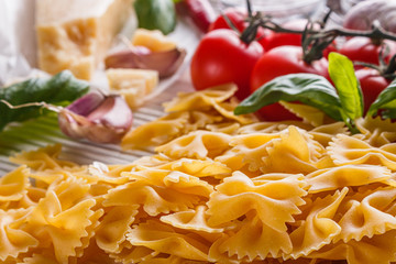 concept of traditional italian pasta with tomatoes and basil