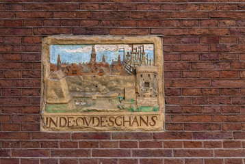 old guild sign on an  brick facade in Amsterdam, Netherland
