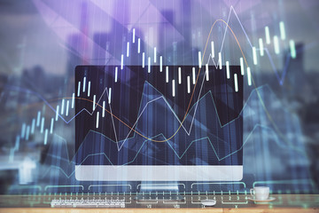 Double exposure of chart and financial info and work space with computer background. Concept of international online trading.