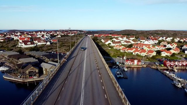 Sm&ouml;gen Bridge, Sweden. Drone video from Kungshamn to Sm&ouml;gen in the morning in July.

All my videos are approved by authorities in Sweden (Luftfartsverket & Lantm&auml;teriet).