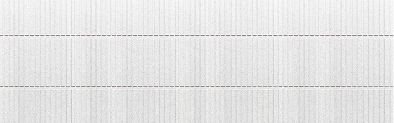 Panorama of Modern white stone wall with stripes texture and seamless background