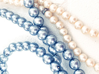 pearl necklace on white background