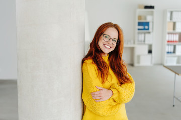 Happy young businesswoman with warm friendly smile