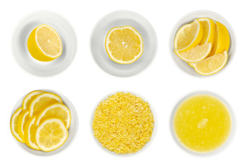 Fresh lemons, cut in half, slices and wedges, lemon zest and juice in white glass bowls. Ripe and yellow citrus fruits, used for culinary and cleaning. Close up from above, isolated over white, photo.