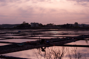 Sunset on the salt evaporation pond.