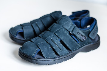 Men's summer shoes are dark blue. New sandals. Classic wardrobe.