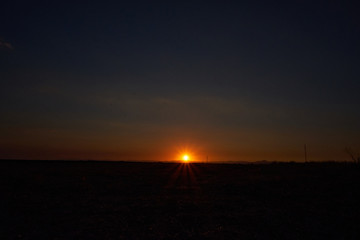 sunset over field