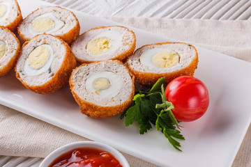 Scotch egg meat balls on rustic wooden background