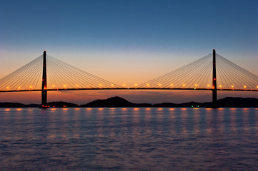 Fototapeta na wymiar Wonderful sunset night view of the grand bridge