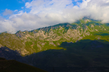 
Beautiful mountain landscape high in the mountains  with clouads of North Ossetia