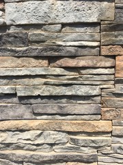 Stone texture  irregularly grey granite stone wall texture and background. 