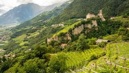Tyrol Castle and Fontana castle  with Venosta Valley in background, Merano, Trentino Alto Adige, northern italy - Europe