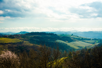 Spring italian landscape with green and blue hills