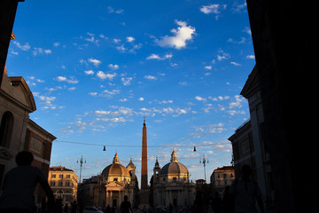 Entrance from Piazzale Flaminio to Piazza del Popolo in Rome. Overall view of the square at sunset.
